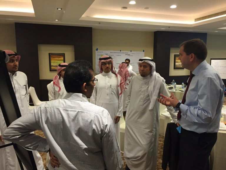 Bernie coaching a group during KPI training